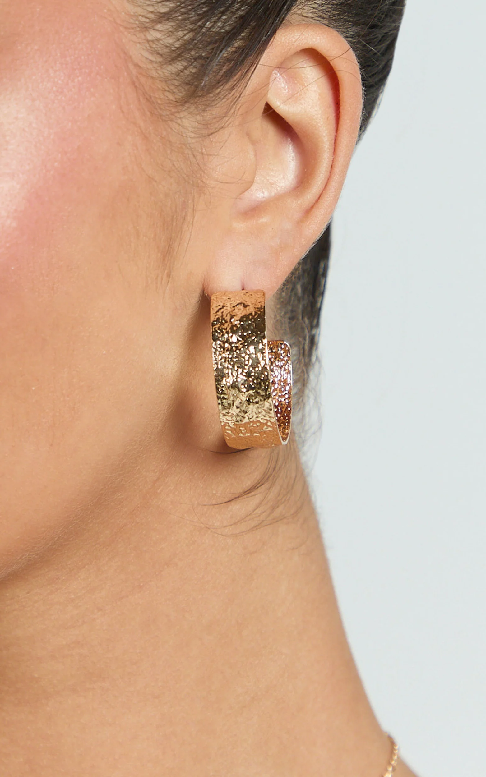 Carli Textured Hoop Earrings in Gold - Image 2