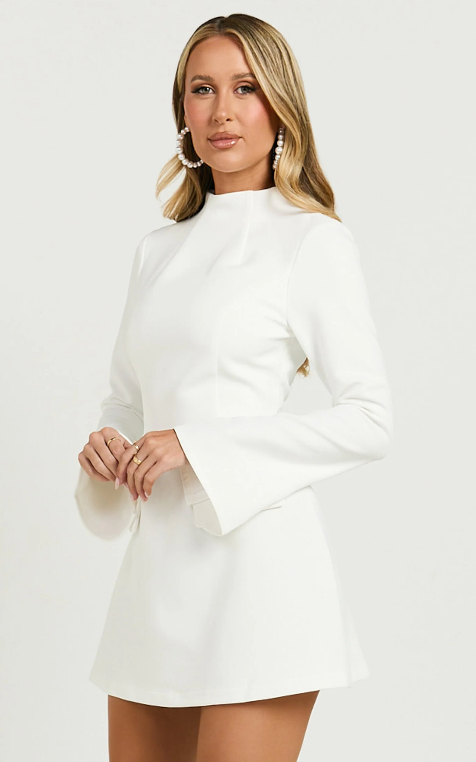 Carlson Mini Dress - High Neck Sleeve Cocoon Skirt Dress in White - Image 5